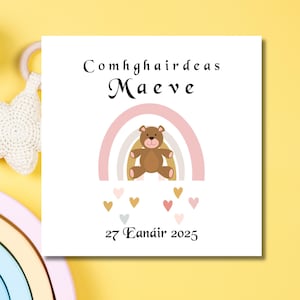 Congrats its a New Baby Girl Card in Irish Language with Teddy Bear, Pink Rainbow and Hearts Design, Comhghairdeas Carta cailín leanbh