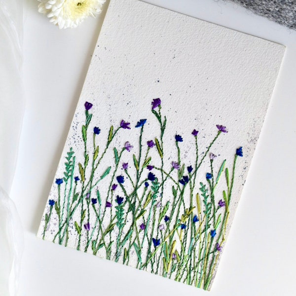 Painted with wildflowers, hand embroidered