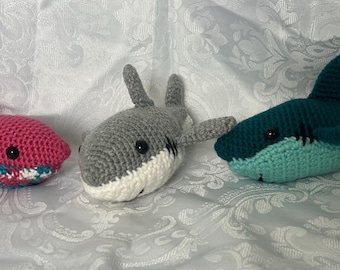 Tiburones de peluche