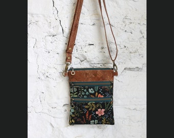 Tressa, triple zipper crossbody bag in Herb Garden in midnight and bronze cork