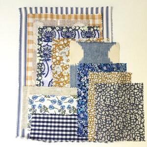 fascio di tessuto blu e giallo cotone Liberty tana lino da prato patchwork scrapbook cuscini progetto fatto a mano regalo per la festa della mamma arredamento da fattoria