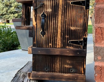 LOGAN BICE’S Custom Squirrel Nesting Box