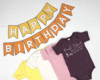 mauve baby onesie