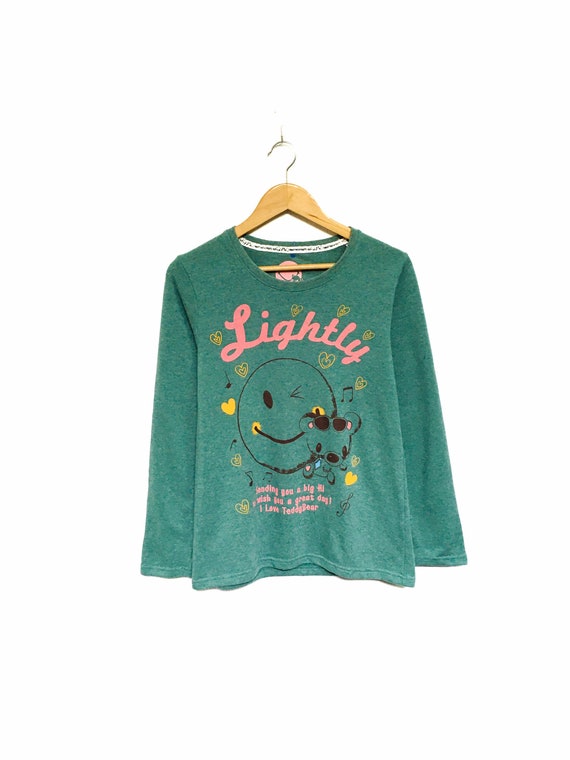 smiley face jumper designer