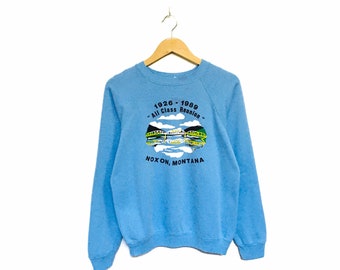 ¡Raro! Sudadera vintage de los 80 y 90 de la reunión de exalumnos de Noxon Montana con etiqueta Hanes, logo grande y cuello redondo / Talla mediana