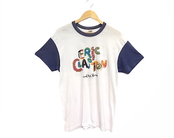 Rara! Maglietta vintage Hanes del 1985 con logo grande, stile rock 'n' roll, del chitarrista del tour di Eric Clapton e della sua band / Taglia XL.