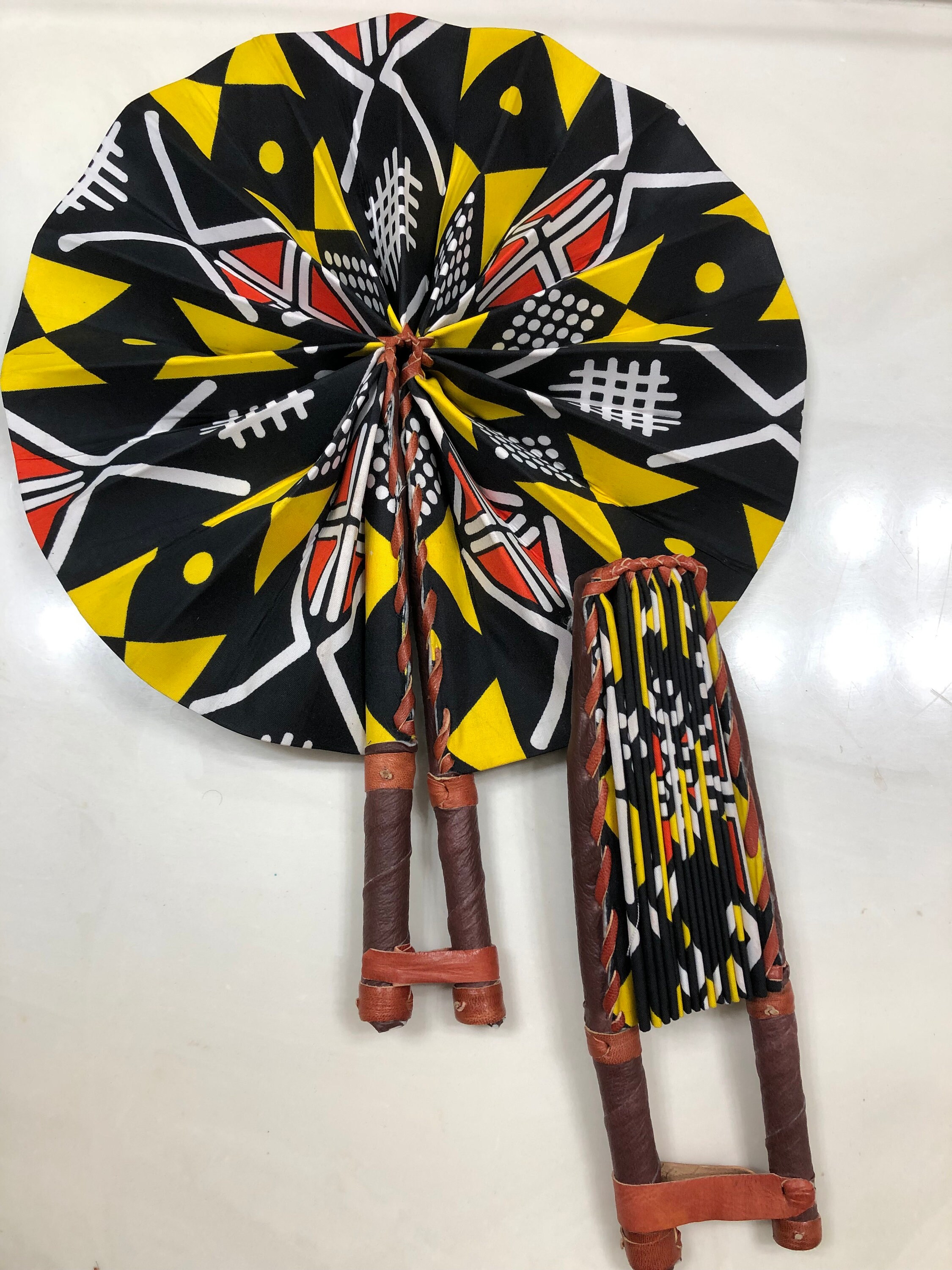 Black yellow Ankara african wedding favor ethnic print fabric round windmill style handmade hand fan with leather trim folding
