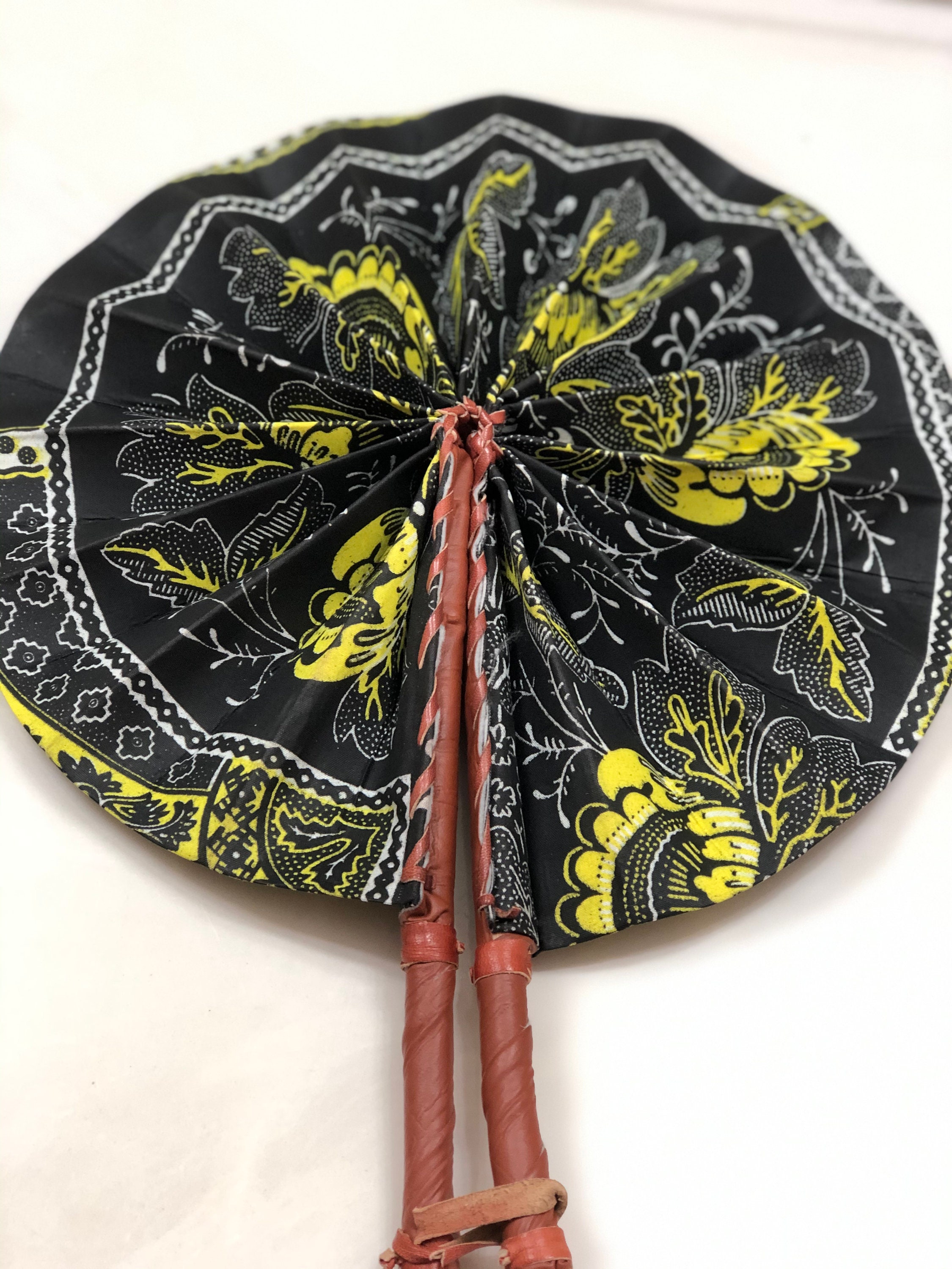 Black yellow Ankara african wedding favor ethnic print fabric round windmill style handmade hand fan with leather trim folding