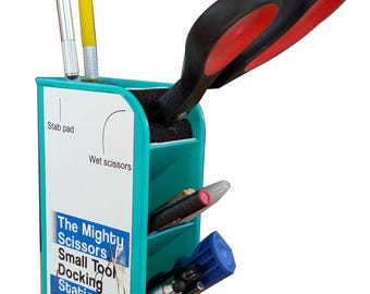 Small Tool organizer for craft scissors, blades, and small tools. Make scissors with non-stick coating with the “Wet” Scissors Bay!