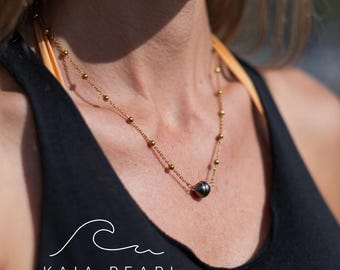 Collar de perlas de Tahití bañadas en oro