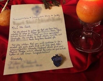 May include: A whimsical scene featuring a white owl figurine with a feather quill, a letter, and a lit candle. The letter is addressed to "Mr. Patill" and includes the word "Prefect". The background includes a crest.