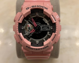 Reloj Casio G-Shock analógico/digital rosa.