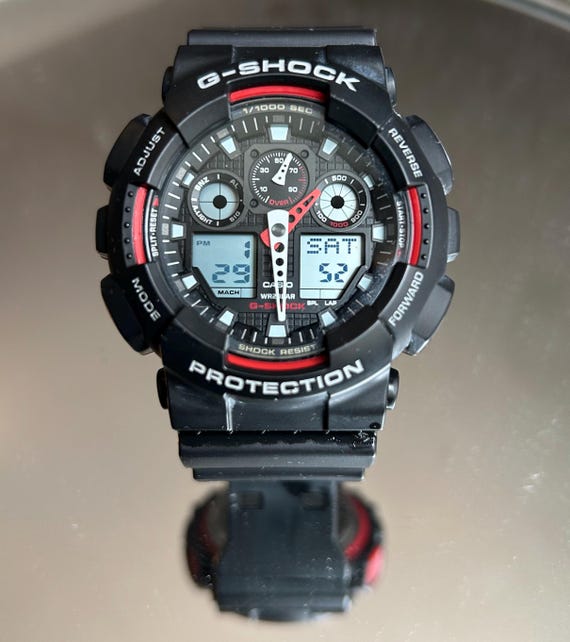 Casio G-Shock GA100 Analog/Digital Watch.