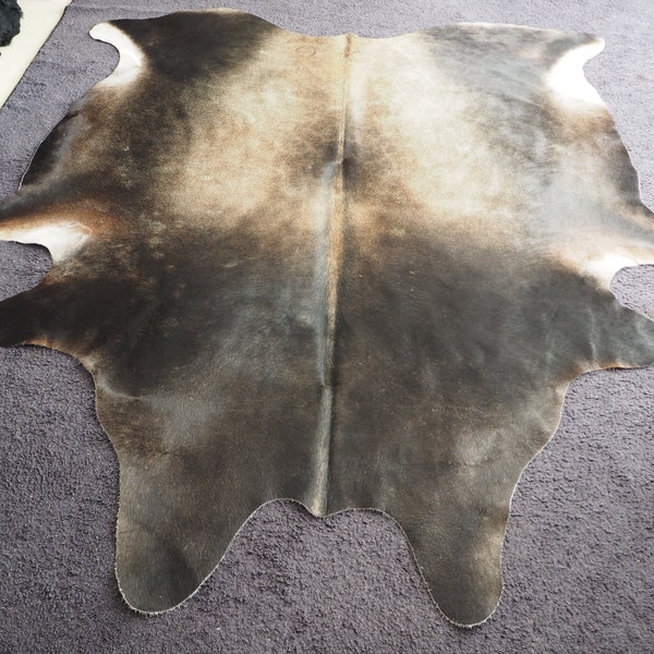 Subtle Sueded Tones of Light and Dark - Charcoal Frames a Sunlight Touched Centre - A Beautiful Hand Selected Premium Cowhide Rug