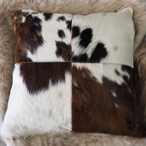A Lovely Tri Coloured 50cm Sq Cowhide Cushion