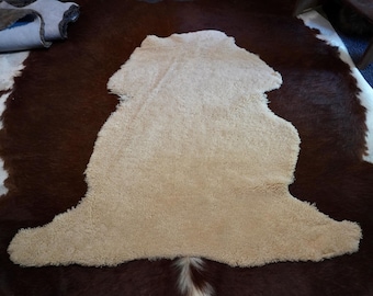 Soft, Natural, Beautiful A Light Camel Toned Trimmed Cotswold Sheepskin Rug