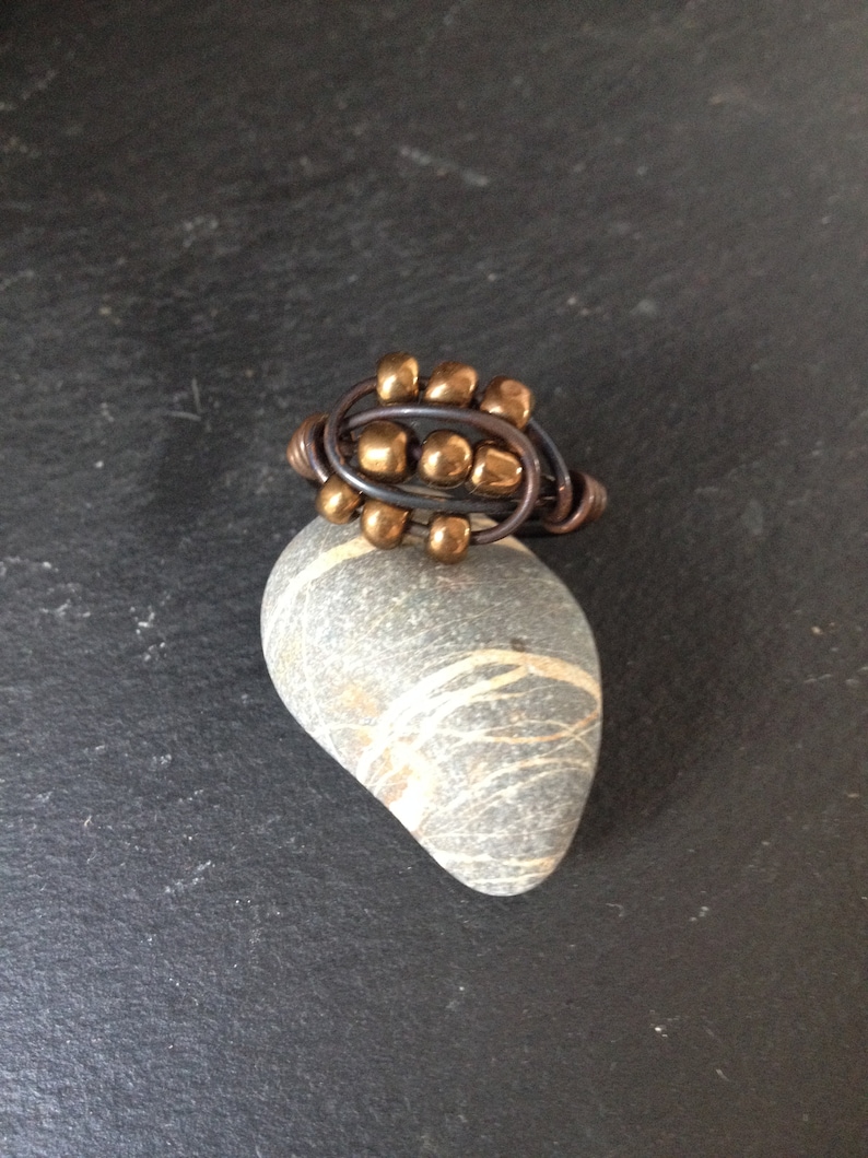 Copper ring with patina and bronze goldish colour beads