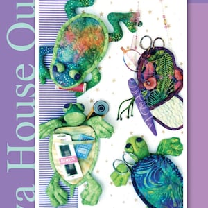 May include: A promotional image for Java House Quilts featuring handmade fabric cases for glasses and notions. The cases are shaped like turtles and butterflies, with colorful, patterned designs. The text "Just In Cases" and "8" Glasses and Notions Cases" is visible.