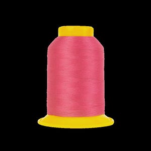 May include: A spool of pink thread with a yellow base and top. The thread is tightly wound around the spool, creating a smooth, cylindrical shape. The bright colors of the thread and spool contrast against the black background.