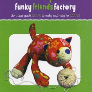 May include: A soft toy cat named Kitty Kate, approximately 13 inches long, with a red floral pattern. The cat is lying down with a ball of yarn. The image includes the text "funky friends factory" and "Soft toys you'll LOVE to make and make to LOVE!"