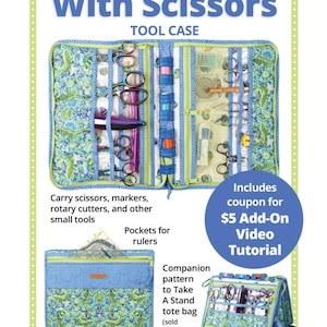 May include: A Running With Scissors tool case featuring a blue and green patterned fabric with various pockets and elastic loops for organizing scissors, markers, and rotary cutters. The case is shown open, closed, and standing upright, with text indicating it is a companion pattern to the Take A Stand tote bag.