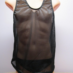 May include: A black sleeveless tank top made of a semi-sheer mesh fabric with a fine grid pattern. The garment features a wide scoop neckline and thick shoulder straps, with solid black trim along the edges of the neck and arm openings.