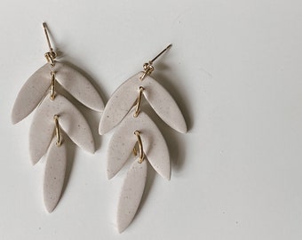 Feathered dangle earrings