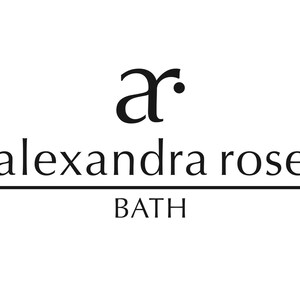 May include: Black and white logo for Alexandra Rose Bath. The logo features the letters "ar" in a stylized font with a dot above the "r". The text "alexandra rose" is below the letters, and the word "BATH" is below that.