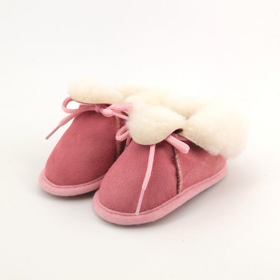 pink baby slippers