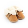 Beige sheepskin baby booties product logo