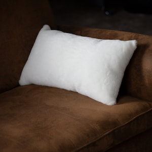 Rectangular sheepskin cushion