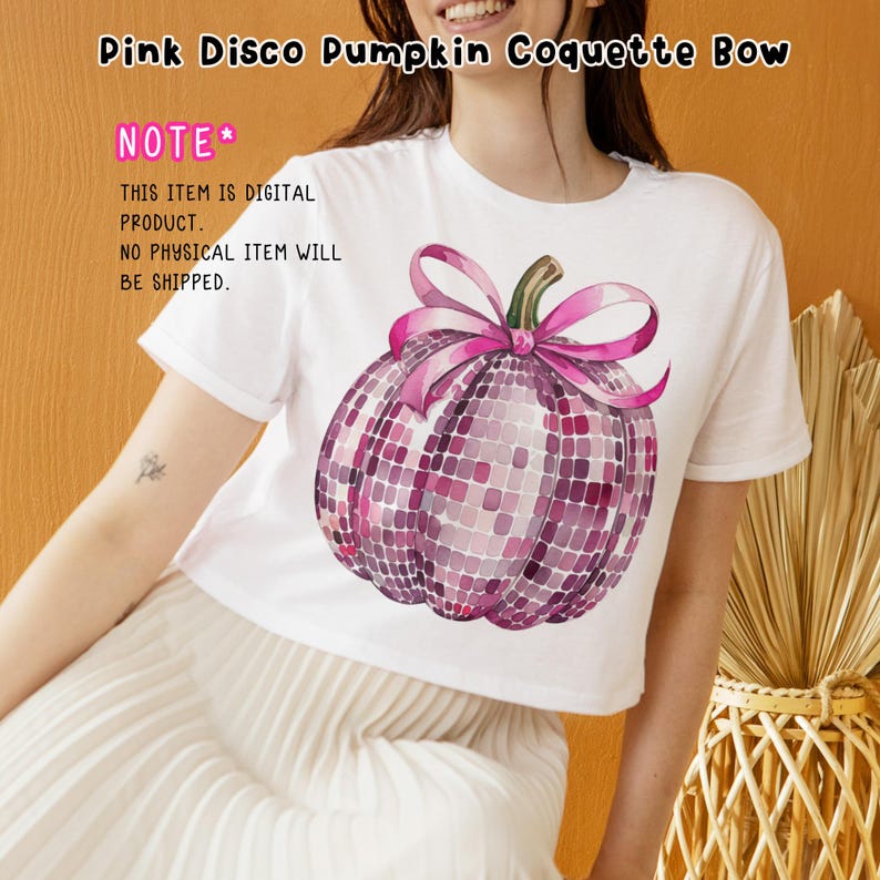 May include: White t-shirt featuring a pink disco ball pumpkin with a pink bow. The text "NOTE* THIS ITEM IS DIGITAL PRODUCT. NO PHYSICAL ITEM WILL BE SHIPPED." is on the shirt.