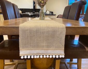 Hessian table runner with a white lace and pom pom trim - country table runner - hessian decor - table decor - pom pom trim - lace runner