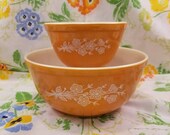 Pyrex butterfly gold 2 nesting mixing bowls set of 2 designed by Gregory Mirow 401 403 1970s flowers and butterflies yellow gold