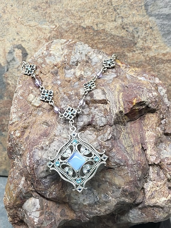 Vintage AVON Necklace Nina Ricci for AVON Blue Cat s Eye Pendant 16 Silver Tone and Crystal Pendant Necklace Vintage Avon Jewelry NR Etsy UK