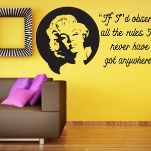 May include: Black and white wall decal featuring a silhouette of Marilyn Monroe with a quote: "If I'd observed all the rules I'd never have got anywhere."