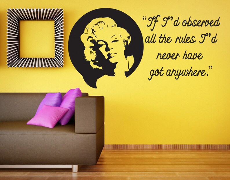 May include: Black and white wall decal featuring a silhouette of Marilyn Monroe with a quote: "If I'd observed all the rules I'd never have got anywhere."