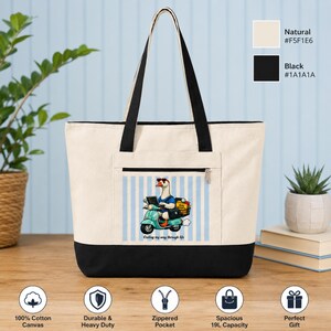 May include: A natural and black canvas tote bag featuring a front zippered pocket. The center graphic displays a goose wearing sunglasses, riding a teal scooter while using a laptop, with the text Coding my way through life printed below.