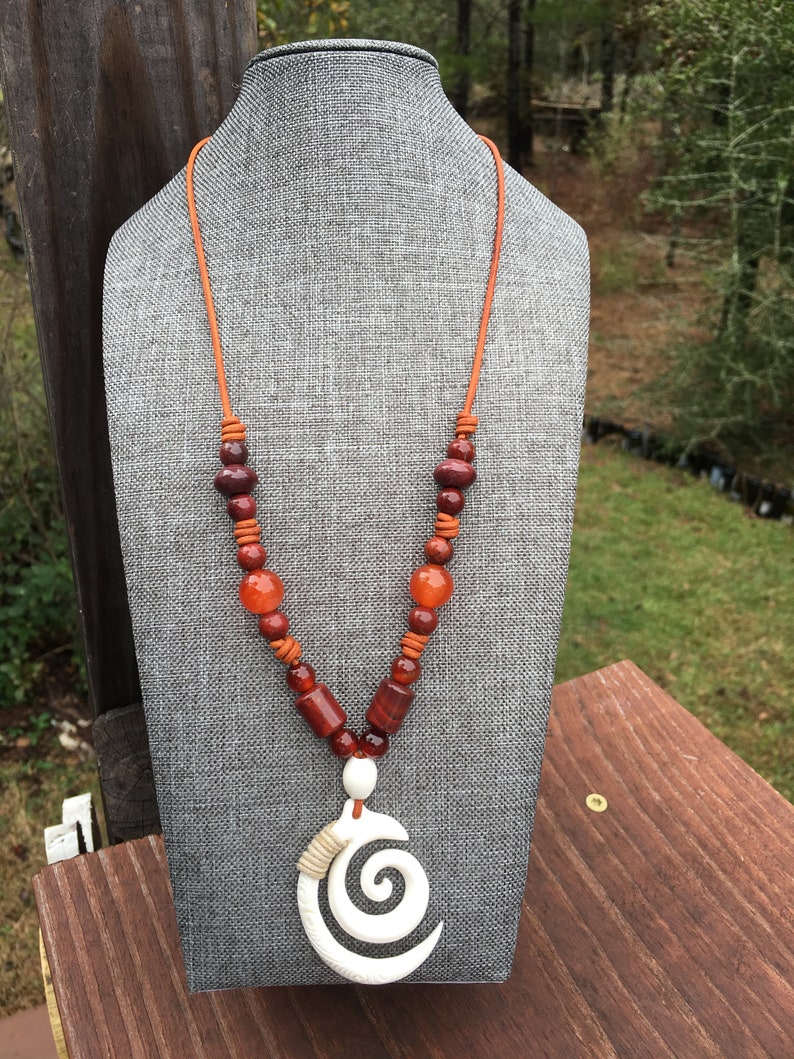 handcarved bone jewelry handmade jewelry red jasper carnelian gemstones brown leather mookite Chakra jewelry