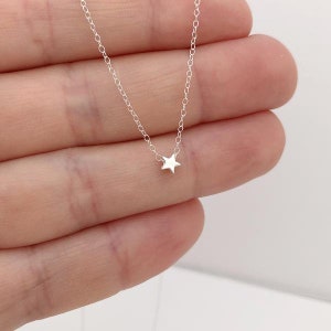 tiny star necklace in sterling silver