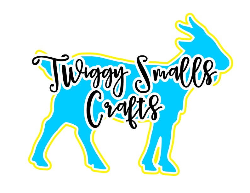 May include: A blue silhouette of a goat with a yellow outline. The text "Twiggy Smalls Crafts" is written in black cursive lettering over the goat.