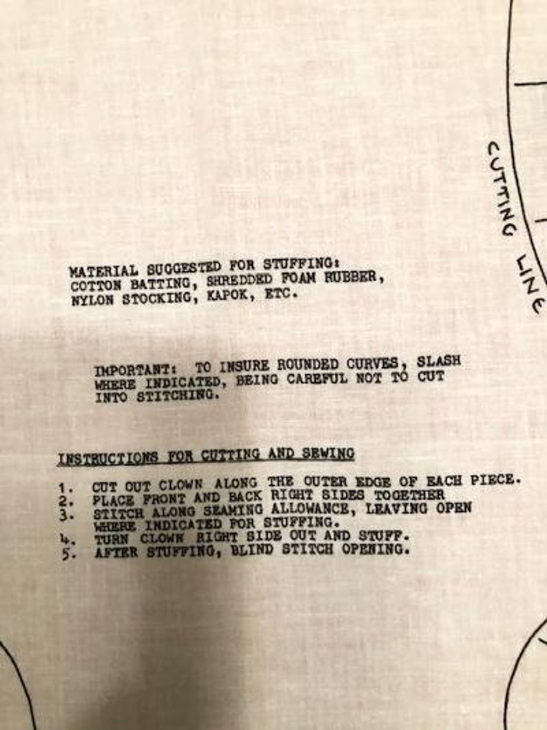 May include: Black and white instructions for sewing a clown doll. The instructions include a list of materials suggested for stuffing, such as cotton batting, shredded foam rubber, nylon stocking, kapok, and more. The instructions also include steps for cutting and sewing the clown doll.