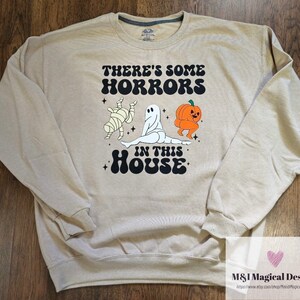 There's some horrors in this house tshirt or sweatshirt Halloween funny saying ghost