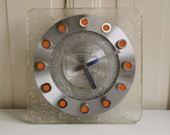 Space age Kienzle International large Wall Clock, Junghans, 1970's, Germany. In Orange, stainless steel and plexiglass. Brutalist best