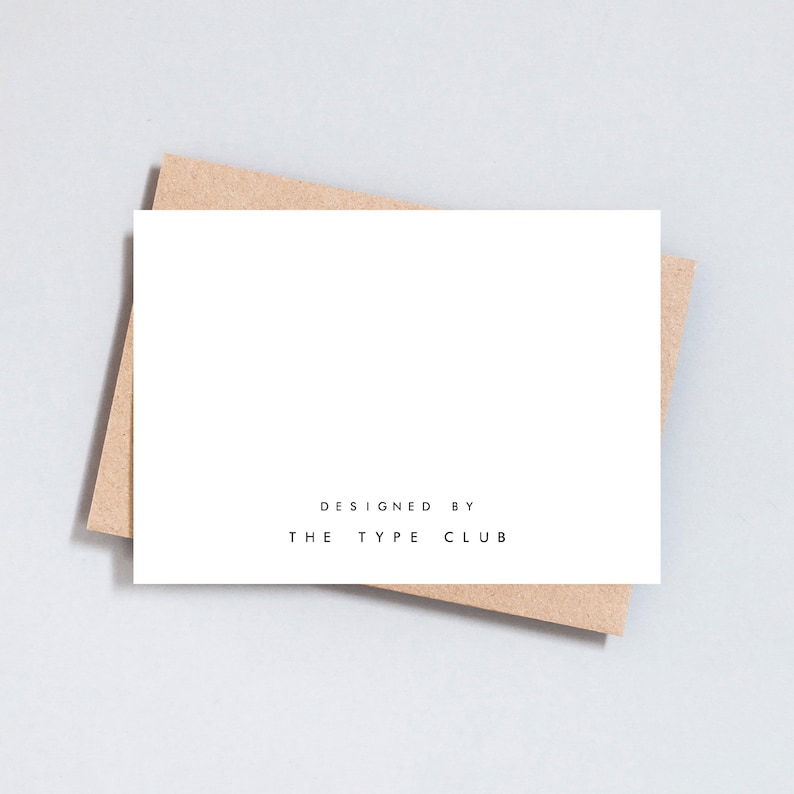 May include: A white card with the text "DESIGNED BY THE TYPE CLUB" printed in black.
