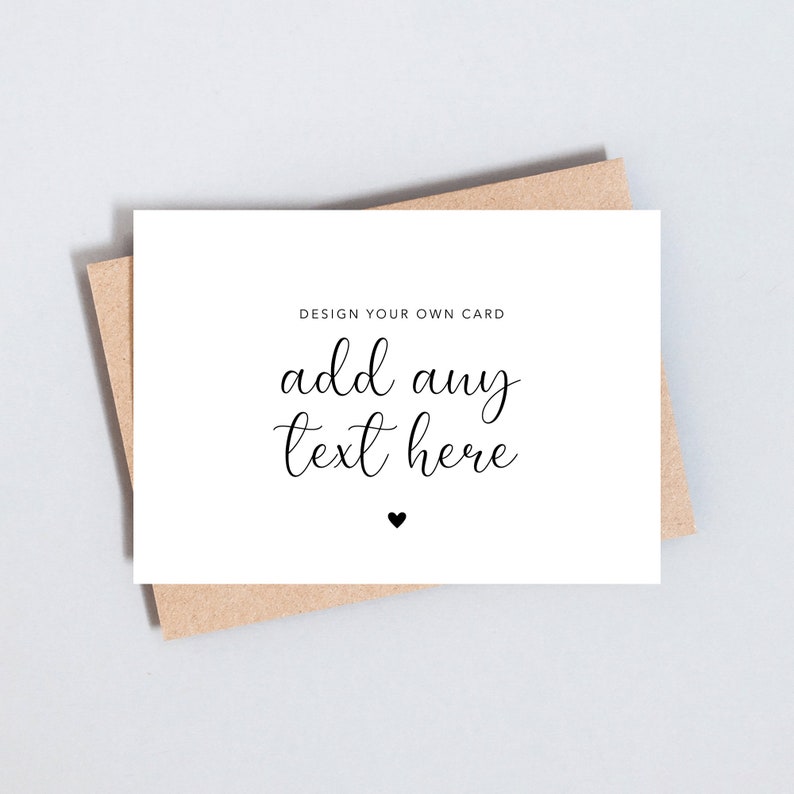 May include: A white card with the text "DESIGN YOUR OWN CARD add any text here" and a small black heart.