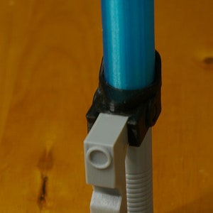 Ezra Bridger's lightsaber rattle image 2