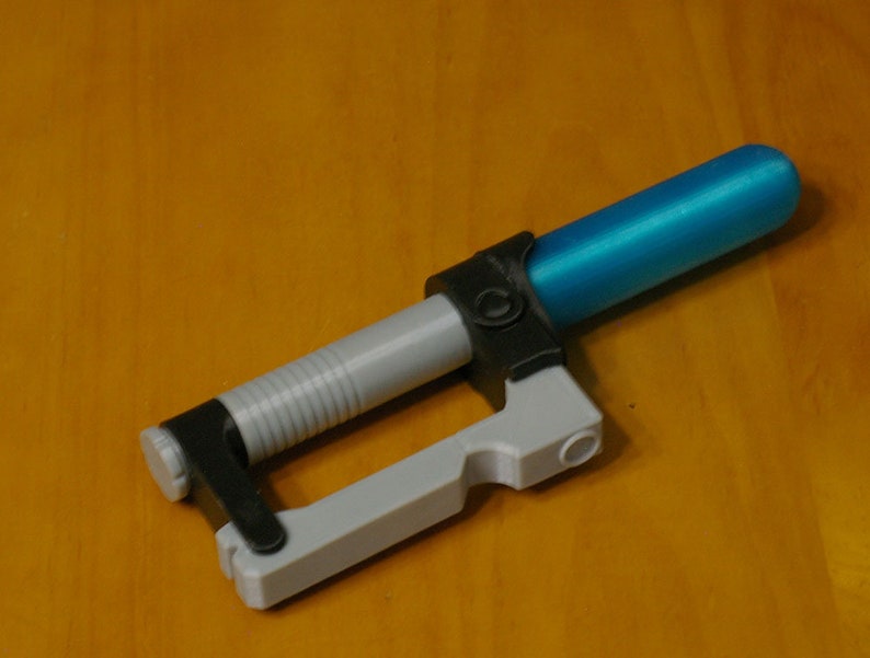 Ezra Bridger's lightsaber rattle image 1