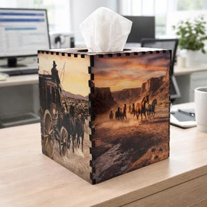 May include: A white ceramic mug with a black handle and the text "But First, Coffee" in a black, bold font. The mug is sitting on a white surface. The mug is approximately 4 inches tall.