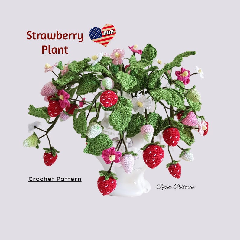 May include: Crochet pattern for a strawberry plant. The plant is made of green and red yarn and has white flowers. The pattern is available as a PDF download. "Strawberry Plant" and "Crochet Pattern" are written on the image.
